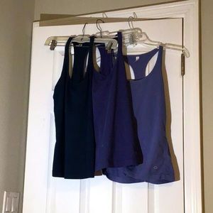 Three GAPfit women’s athletic tank tops